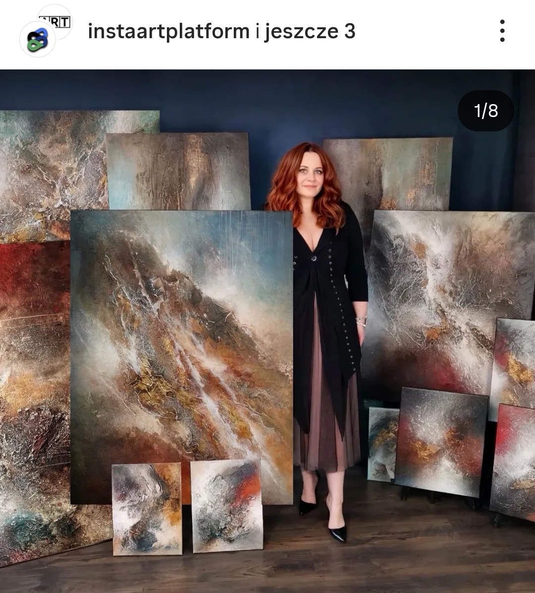 Abstract artist and large-scale paintings in a studio and modern interiors