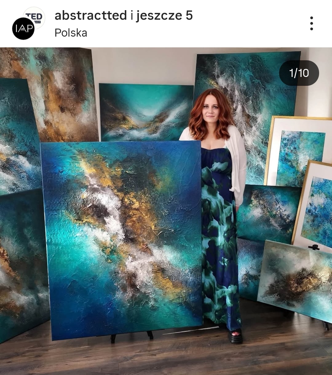 Abstract artist and large-scale paintings in a studio and modern interiors