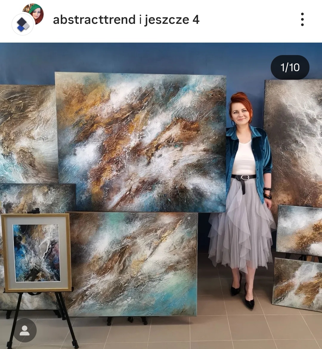 Abstract artist and large-scale paintings in a studio and modern interiors